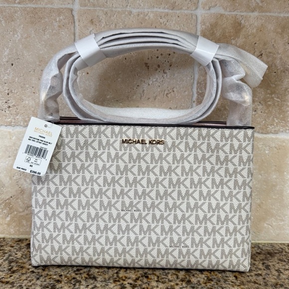 Michael Kors Handbags - Michael Kors White and Gray Crossbody Monogram Bag NWT